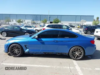 2015 BMW 4 Series 435i with VIN WBA3R1C50FF774588, listed as a IAAI auction lot 42001394 with 96,400 mi miles and . Bid and sale history available at carsss.com. Image 15.