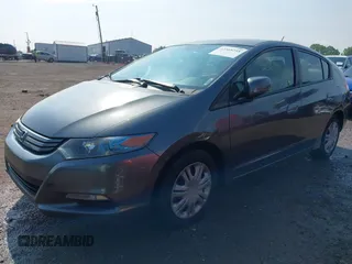 2011 Honda Insight LX z VIN JHMZE2H54BS000481, wystawiony jako IAAI lot #42368258 z przebiegiem 256 894 mil mil oraz . Historia ofert i sprzedaży dostępna na DreamBid. Obrazek 2.