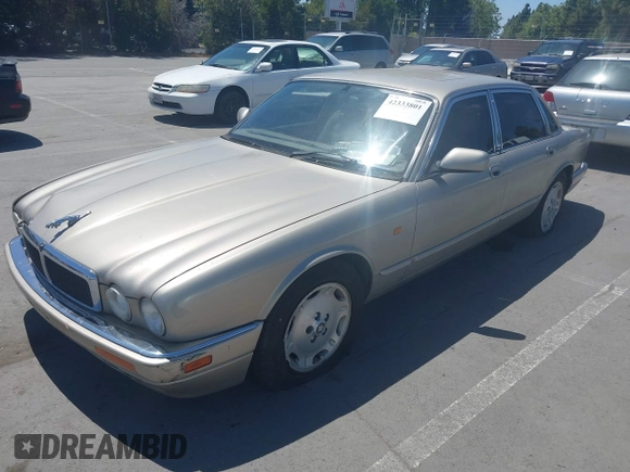 1997 Jaguar XJ with VIN SAJHX1243VC811674, listed as a IAAI auction lot 42333801 with 213,248 mi miles and . Bid and sale history available at DreamBid. Image 6.