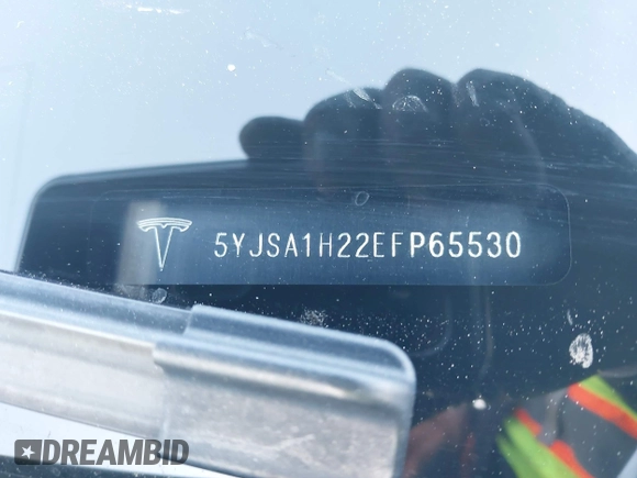 2014 Tesla Model S P85D with VIN 5YJSA1H22EFP65530, listed as a IAAI auction lot 41959941 with 76,532 mi miles and . Bid and sale history available at DreamBid. Image 9.