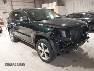 2014 Jeep Grand Cherokee Overland with VIN 1C4RJFCGXEC162109, listed as a IAAI auction lot 41943979 with 147,788 mi miles. Bid and sale history available at carsss.com. Image 1.