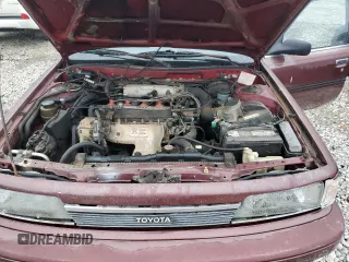 1989 Toyota Camry DLX z VIN 4T1SV21E1KU108151, wystawiony jako Copart lot #73657634 z przebiegiem 347 186 mil mil oraz Nie do naprawy • Non repairable. Historia ofert i sprzedaży dostępna na DreamBid. Obrazek 11.