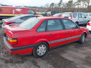 1991 Volkswagen Passat z VIN WVWFB4315ME035691, wystawiony jako IAAI lot #41627396 z przebiegiem 168 795 mil mil oraz . Historia ofert i sprzedaży dostępna na DreamBid. Obrazek 4.
