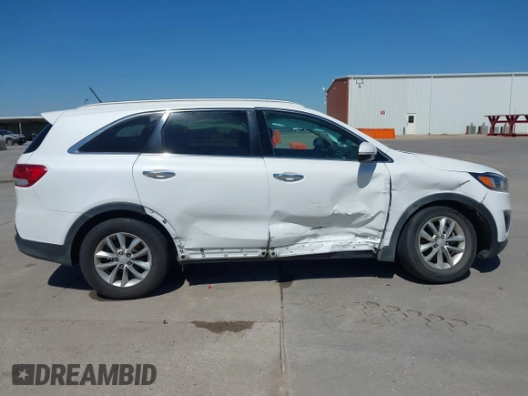 2016 Kia Sorento LX z VIN 5XYPGDA50GG141084, wystawiony jako IAAI lot #41848617 z przebiegiem 102 576 mil mil oraz . Historia ofert i sprzedaży dostępna na DreamBid. Obrazek 13.