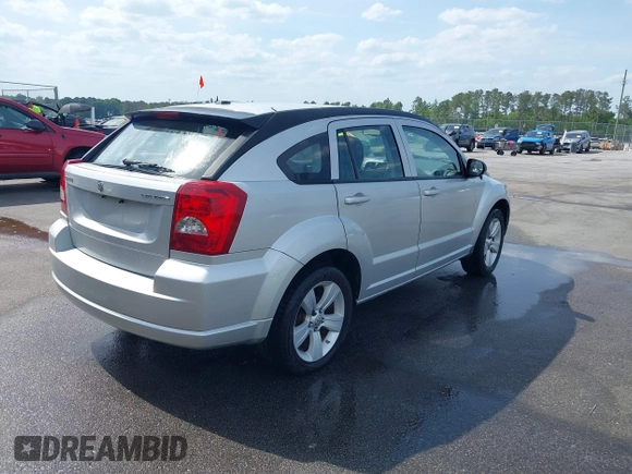 2011 Dodge Caliber Mainstreet with VIN 1B3CB3HA2BD179211, listed as a IAAI auction lot 42084745 with 136,276 mi miles. Bid and sale history available at carsss.com. Image 4.