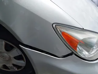2003 Toyota Camry LE with VIN 4T1BE32K73U157902, listed as a IAAI auction lot 42248544 with 106,675 mi miles and . Bid and sale history available at DreamBid. Image 12.