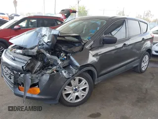 2015 Ford Escape S with VIN 1FMCU0F74FUB81395, listed as a IAAI auction lot 42122007 with 156,736 mi miles and . Bid and sale history available at DreamBid. Image 2.