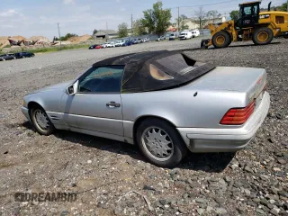1997 Mercedes-Benz SL-Class with VIN WDBFA67FXVF142041, listed as a Copart auction lot 69598214 with 0 mi miles and Clean Title. Bid and sale history available at carsss.com. Image 2.