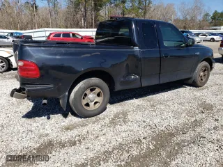 2002 Ford F-150 XL with VIN 1FTRX07252KC90074, listed as a Copart auction lot 48565215 with 0 mi miles and Salvage Title. Bid and sale history available at carsss.com. Image 3.