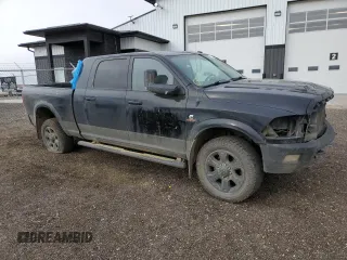 2015 Ram 3500 Laramie with VIN 3C63R3ML9FG590199, listed as a Copart auction lot 74700724 with 297,776 mi miles and Salvage Title. Bid and sale history available at carsss.com. Image 4.