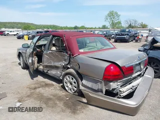 2004 Mercury Grand Marquis LS Premium z VIN 2MEFM75W34X674542, wystawiony jako IAAI lot #42018186 z przebiegiem 137 944 mil mil oraz . Historia ofert i sprzedaży dostępna na DreamBid. Obrazek 3.