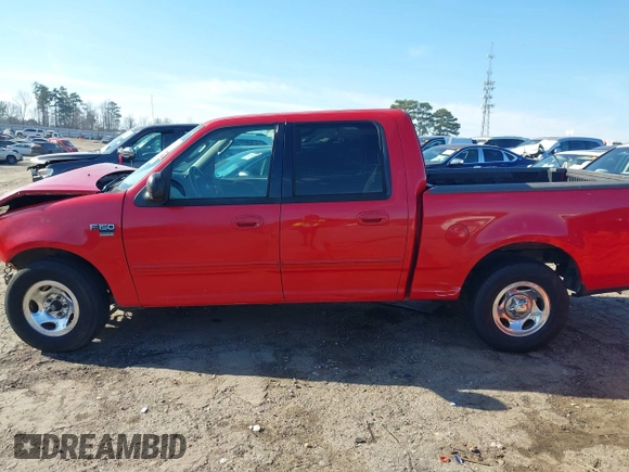 2003 Ford F-150 XLT with VIN 1FTRW07L03KC47484, listed as a IAAI auction lot 41653389 with 283,296 mi miles. Bid and sale history available at carsss.com. Image 14.