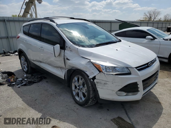 2013 Ford Escape SEL with VIN 1FMCU9H9XDUB08144, listed as a Copart auction lot 52887545 with 142,451 mi miles and Salvage Title. Bid and sale history available at DreamBid. Image 4.