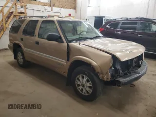 2000 GMC Jimmy SLT Convenience with VIN 1GKDT13WXY2109634, listed as a Copart auction lot 49811075 with 190,465 mi miles and Salvage Title. Bid and sale history available at carsss.com. Image 4.