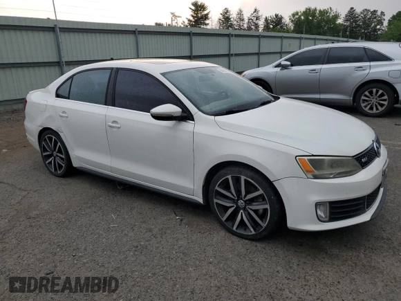 2014 Volkswagen Jetta GLI with VIN 3VW4T7AJ4EM384679, listed as a Copart auction lot 64014195 with 137,793 mi miles and Clean title. Bid and sale history available at DreamBid. Image 4.