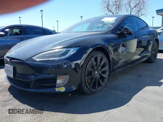 2018 Tesla Model S 75D with VIN 5YJSA1E20JF282889, listed as a IAAI auction lot 41823505 with 110,049 mi miles and . Bid and sale history available at DreamBid. Image 6.