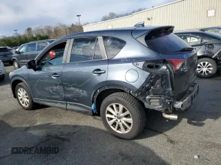 2013 Mazda CX-5 Touring with VIN JM3KE4CE2D0115012, listed as a Copart auction lot 49902355 with 239,562 mi miles and Salvage Title. Bid and sale history available at DreamBid. Image 2.