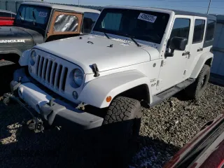 2016 Jeep Wrangler Unlimited 75th Anniversary with VIN 1C4HJWEG3GL185999, listed as a Copart auction lot 42060225 with 112,769 mi miles and Salvage title. Bid and sale history available at DreamBid. Image 1.