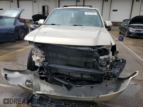 2010 Ford Escape Limited z VIN 1FMCU9EG2AKB77985, wystawiony jako Copart lot #56747655 z przebiegiem 88 362 mil mil oraz Szkoda całkowita • Salvage title. Historia ofert i sprzedaży dostępna na DreamBid. Obrazek 5.