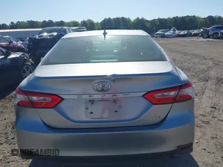 2019 Toyota Camry LE z VIN 4T1B11HK7KU756675, wystawiony jako IAAI lot #42063923 z przebiegiem 132 312 mil mil oraz . Historia ofert i sprzedaży dostępna na DreamBid. Obrazek 16.
