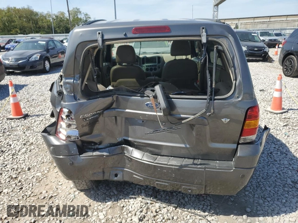 2005 Ford Escape Limited with VIN 1FMYU94175KB94533, listed as a Copart auction lot 71092124 with 156,992 mi miles and Salvage Title. Bid and sale history available at carsss.com. Image 6.