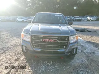2021 GMC Canyon 4WD AT4 w/Leather with VIN 1GTG6FEN7M1156069, listed as a Copart auction lot 89345225 with 66,164 mi miles and Salvage Title. Bid and sale history available at carsss.com. Image 11.