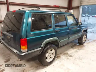 1997 Jeep Cherokee Sport with VIN 1J4FJ68S9VL594152, listed as a IAAI auction lot 41732573 with 65,316 mi miles. Bid and sale history available at carsss.com. Image 4.