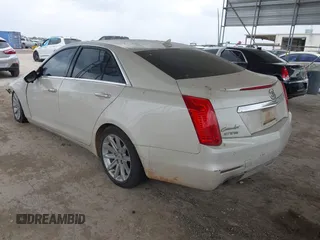 2014 Cadillac CTS RWD z VIN 1G6AP5SXXE0182114, wystawiony jako IAAI lot #42157993 z przebiegiem 132 507 mil mil oraz . Historia ofert i sprzedaży dostępna na DreamBid. Obrazek 3.