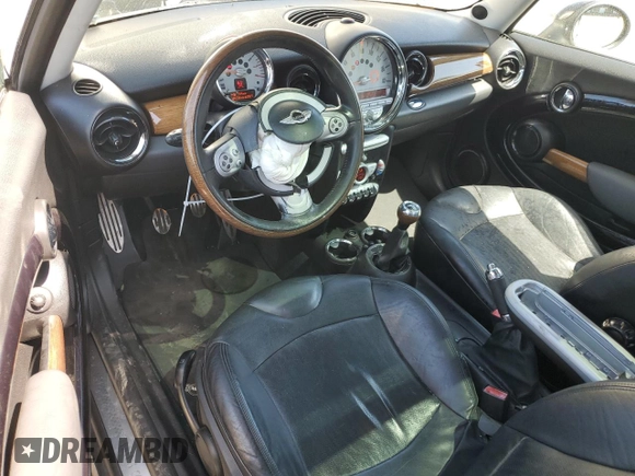 2009 MINI Hardtop S with VIN WMWMF73549TT94143, listed as a Copart auction lot 52120615 with 144,334 mi miles and Salvage Title. Bid and sale history available at DreamBid. Image 8.