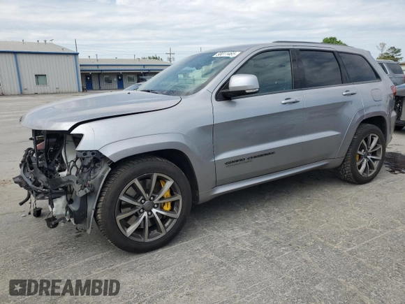 2018 Jeep Grand Cherokee Trackhawk with VIN 1C4RJFN91JC223825, listed as a Copart auction lot 58011465 with 83,177 mi miles and Salvage title. Bid and sale history available at DreamBid. Image 1.