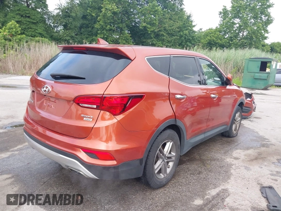 2017 Hyundai Santa Fe 2.4L z VIN 5XYZTDLB6HG451345, wystawiony jako IAAI lot #42665264 z przebiegiem 129 855 mil mil oraz . Historia ofert i sprzedaży dostępna na DreamBid. Obrazek 4.
