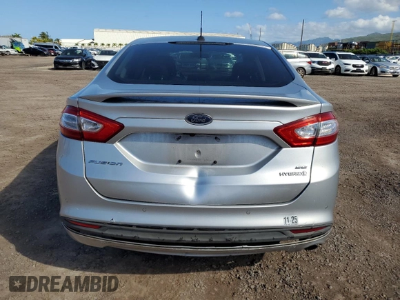 2013 Ford Fusion SE Hybrid z VIN 3FA6P0LU8DR325849, wystawiony jako Copart lot #53520515 z przebiegiem 93 615 mil mil oraz Czysty tytuł • Clean title. Historia ofert i sprzedaży dostępna na DreamBid. Obrazek 6.