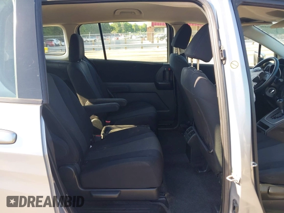2012 Mazda 5 Sport with VIN JM1CW2BLXC0129303, listed as a IAAI auction lot 42556899 with 200,863 mi miles and . Bid and sale history available at DreamBid. Image 8.