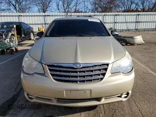 2010 Chrysler Sebring Touring with VIN 1C3CC4FB7AN217431, listed as a Copart auction lot 55181634 with 102,641 mi miles and Salvage Title. Bid and sale history available at DreamBid. Image 5.