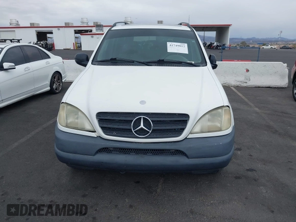 1998 Mercedes-Benz M-Class with VIN 4JGAB54E8WA033005, listed as a IAAI auction lot 41749012 with 194,731 mi miles. Bid and sale history available at carsss.com. Image 6.