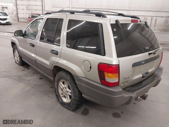 2003 Jeep Grand Cherokee Laredo with VIN 1J4GW48SX3C544237, listed as a IAAI auction lot 40823228 with 1 mi miles. Bid and sale history available at carsss.com. Image 3.
