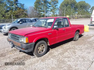 1991 Mazda B-Series Truck with VIN JM2UF3130M0121445, listed as a IAAI auction lot 41646079 with 271,494 mi miles and . Bid and sale history available at DreamBid. Image 2.