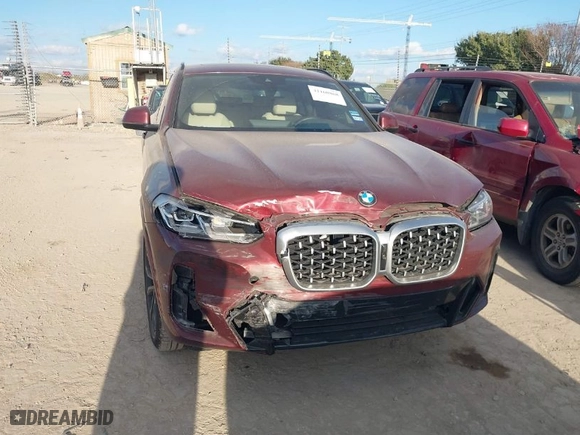 2022 BMW X4 xDrive30i with VIN 5UX33DT02N9K32561, listed as a IAAI auction lot 41160868 with NaN miles. Bid and sale history available at carsss.com. Image 12.