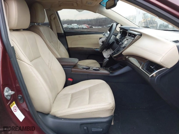 2013 Toyota Avalon XLE with VIN 4T1BK1EB4DU029014, listed as a IAAI auction lot 41689404 with 130,297 mi miles. Bid and sale history available at carsss.com. Image 5.