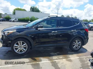 2013 Hyundai Santa Fe Sport z VIN 5XYZUDLA1DG050879, wystawiony jako IAAI lot #42236937 z przebiegiem 124 779 mil mil oraz . Historia ofert i sprzedaży dostępna na DreamBid. Obrazek 14.