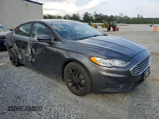 2020 Ford Fusion SE with VIN 3FA6P0HD0LR184251, listed as a Copart auction lot 57325205 with 99,142 mi miles and Salvage title. Bid and sale history available at DreamBid. Image 4.