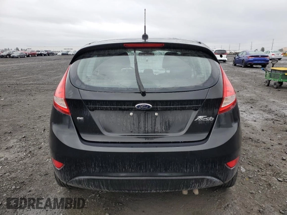 2013 Ford Fiesta SE with VIN 3FADP4EJ5DM119614, listed as a Copart auction lot 48731575 with 64,676 mi miles and Salvage Title. Bid and sale history available at carsss.com. Image 6.