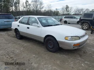 1996 Toyota Camry LE with VIN 4T1BF12K0TU874059, listed as a IAAI auction lot 41416655 with 195,700 mi miles and . Bid and sale history available at DreamBid. Image 1.