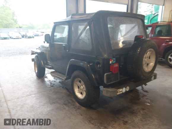 2005 Jeep Wrangler X with VIN 1J4FA39S95P356033, listed as a IAAI auction lot 42252776 with 40,512 mi miles and . Bid and sale history available at DreamBid. Image 3.