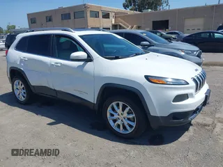 2015 Jeep Cherokee Limited z VIN 1C4PJMDS4FW729171, wystawiony jako IAAI lot #42407596 z przebiegiem 108 598 mil mil oraz . Historia ofert i sprzedaży dostępna na DreamBid. Obrazek 1.