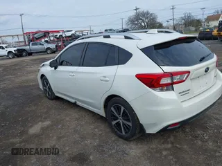 2019 Subaru Impreza Premium with VIN 4S3GTAC62K3704035, listed as a IAAI auction lot 42025822 with 76,067 mi miles and . Bid and sale history available at DreamBid. Image 3.