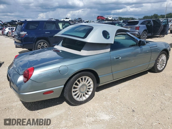 2004 Ford Thunderbird Pacific Coast Roadster with VIN 1FAHP63A04Y108766, listed as a Copart auction lot 74766964 with 30,107 mi miles and Salvage Title. Bid and sale history available at DreamBid. Image 3.