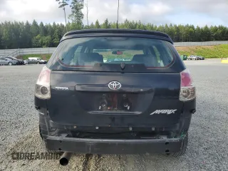 2006 Toyota Matrix STD with VIN 2T1KR32E06C574475, listed as a Copart auction lot 61020935 with 142,942 mi miles and Salvage title. Bid and sale history available at DreamBid. Image 6.