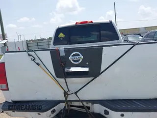 2012 Nissan Titan SL with VIN 1N6BA0EC1CN326919, listed as a IAAI auction lot 42630368 with 230,215 mi miles and . Bid and sale history available at DreamBid. Image 16.