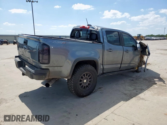 2018 Chevrolet Colorado 4WD ZR2 z VIN 1GCPTEE11J1243686, wystawiony jako Copart lot #58235125 z przebiegiem 144 760 mil mil oraz Szkoda całkowita • Salvage title. Historia ofert i sprzedaży dostępna na DreamBid. Obrazek 3.